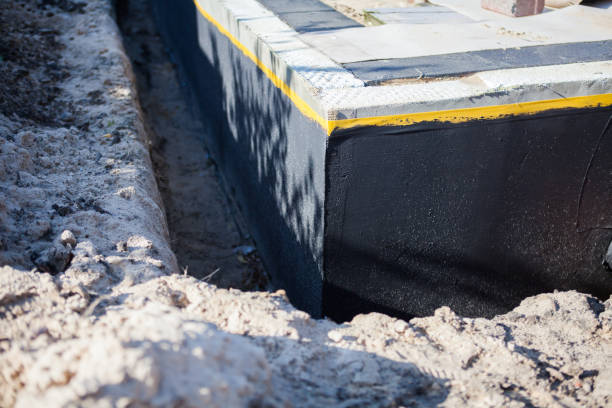 Professional Interior Drainage System technician working in Birmingham, MI
